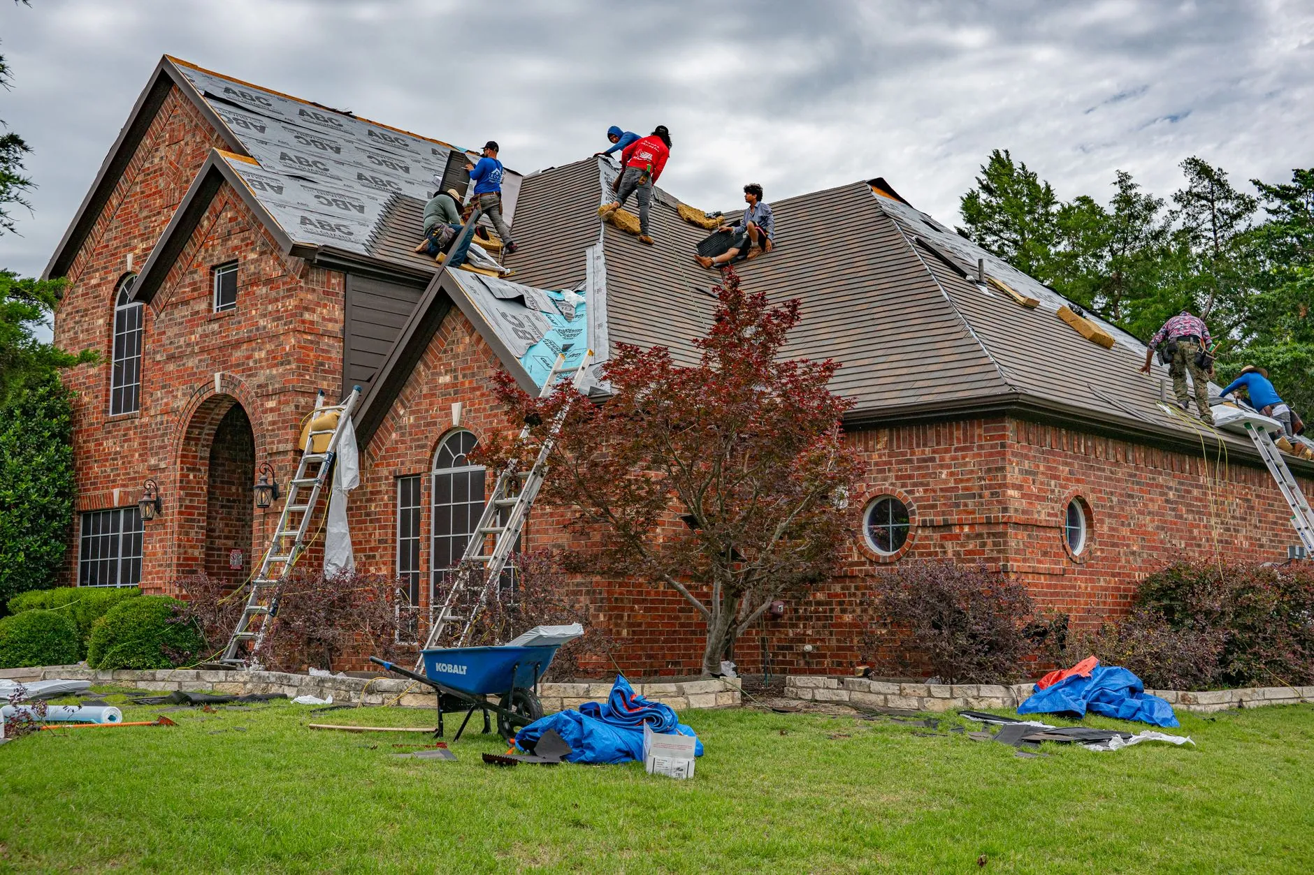 A Castlegate crew stripping and re-roofing a family home